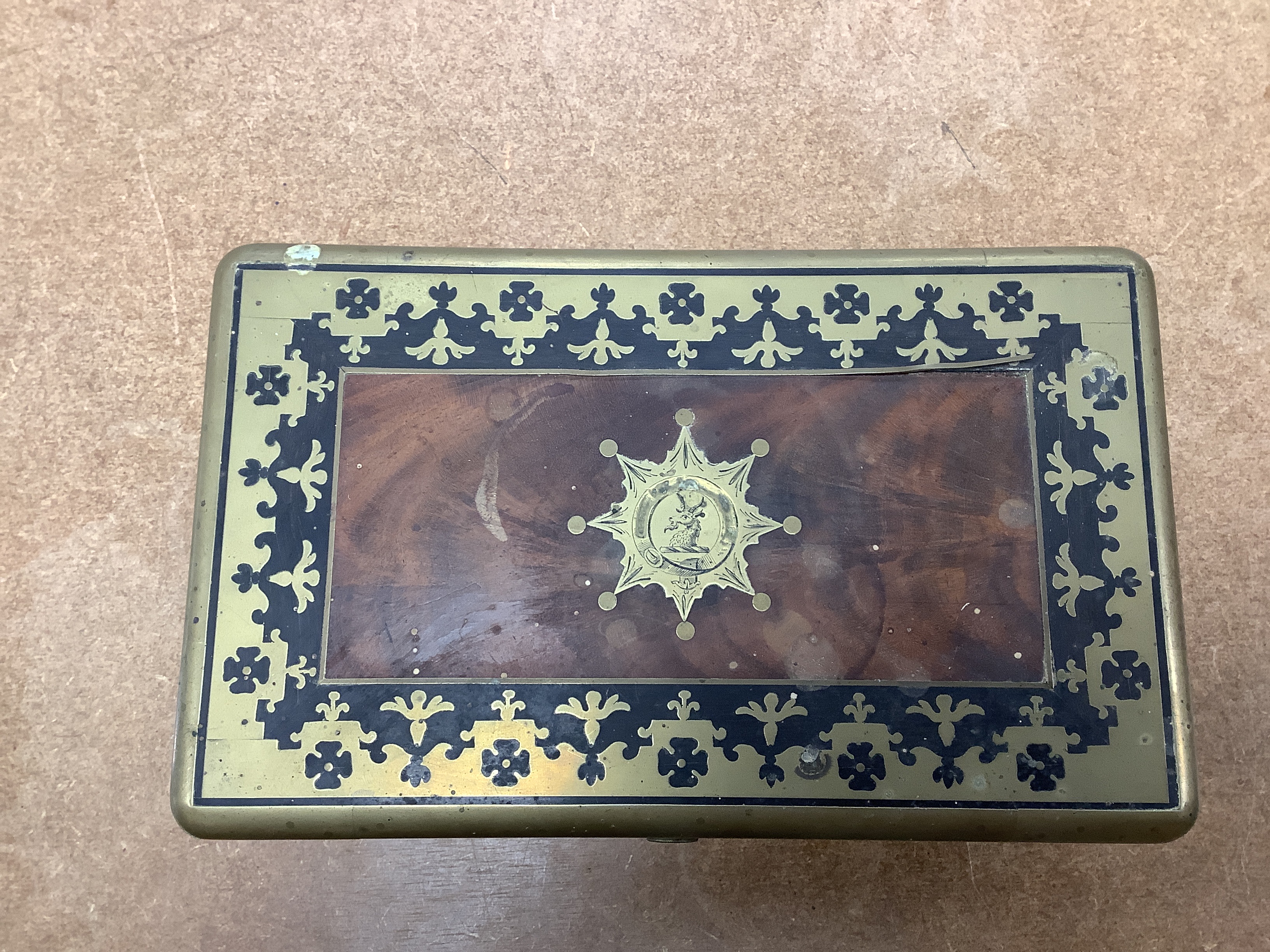 A William IV Cut brass, mahogany and ebony travelling vanity box, with silver-capped bottles, 24.5cm wide